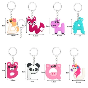 Collection of animal alphabet PVC keychains with precise size measurements in cm