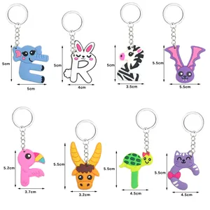 Detailed dimension guide showcasing various colorful PVC alphabet animal shaped keychains