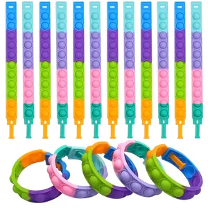 Set di braccialetti pop fidget in silicone arcobaleno per alleviare lo stress e divertirsi