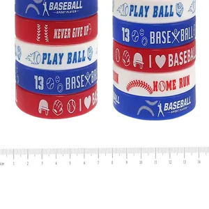 Detail of baseball silicone wristbands with sport slogans and measurement scale ruler.