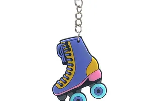 High-definition detailed view of a colorful retro style 2D PVC roller skate keychain charm
