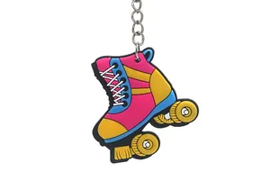 Vibrant pink and yellow PVC roller skate keychain pendant accessory for bags and keys