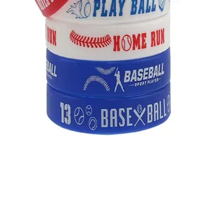 Close-up of colorful printed silicone wristbands featuring baseball and softball sports themes