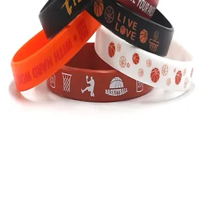 Close-up detail of sports basketball silicone wristbands with motivational printed text