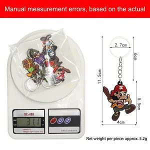 Dimensions et poids du porte-clés pirate en PVC, longueur totale de 11,5 cm info.