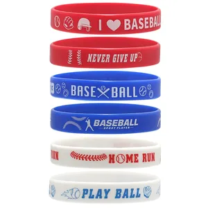 Set of motivational baseball silicone wristbands in red blue and white for youth athletes.