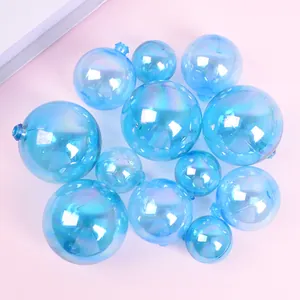 Close-up of assorted sizes iridescent blue decorative balls for cake topper decorations