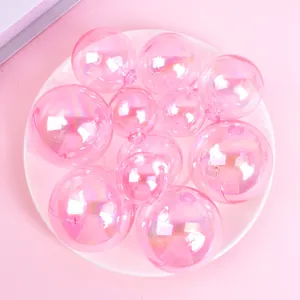 Detailed view of iridescent pink holographic balls for cake decoration and party ornament