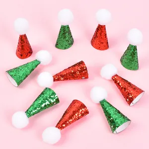 Detailed shot of mini glittery Christmas hats with white pom-poms for small pets