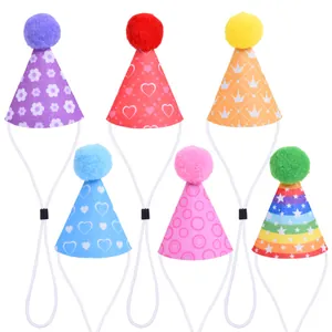 Detailed view of six colorful pet party hats with varying patterns and fluffy pom-pom tops