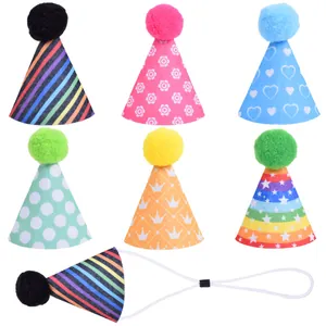 Set of colorful mini pet birthday hats with various patterns and plush pom-poms