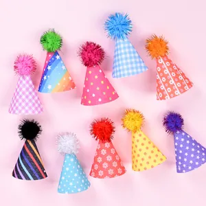 Set of 10 colorful patterned cone hats with pom-poms for pet birthday parties