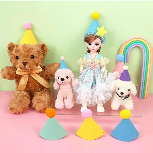 Colorful mini felt party hats with pom-poms displayed on stuffed animals and dolls