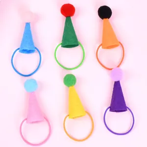 Detailed view of colorful felt miniature party hats for small pets like hamsters