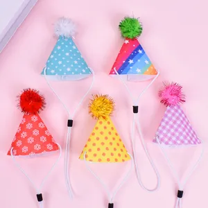 Set of colorful patterned pet birthday hats with pom-poms and adjustable chin straps
