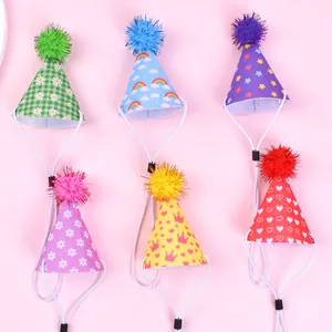 Detailed view of various colorful patterned pet birthday hats for cats and dogs