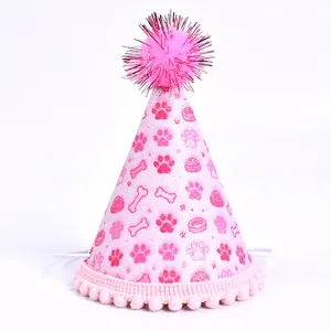 Chapeau d'anniversaire pailleté rose pour animaux avec motifs de pattes et d'os pour chiens