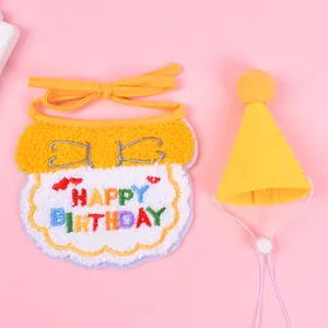 Yellow pet birthday bib and hat set with Happy Birthday embroidery on pink background