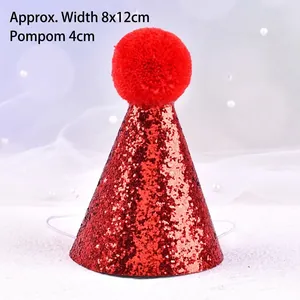 Detailed view of red glitter pet party hat with plush pom-pom and elastic strap