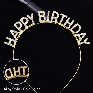 Detail of golden Happy Birthday rhinestone headband showing alloy texture