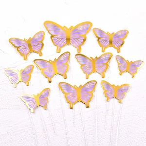 Detailed view of elegant purple butterfly cake toppers featuring premium gold foil edges on sticks