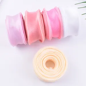 Detailed view of 4cm fishtail yarn ribbons in assorted pastel colors for floral decor