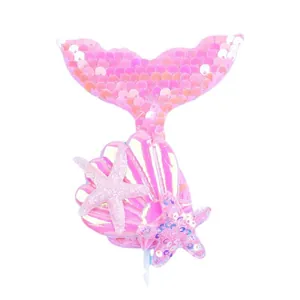 Mermaid tail cake topper with pink sequins and holographic seashell decor