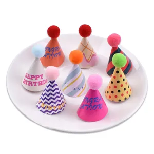 Set of 8 colorful mini pom-pom party hats for cake topper and baking decoration.