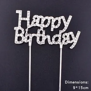 Close-up detail of silver rhinestone encrusted Happy Birthday cake topper decoration