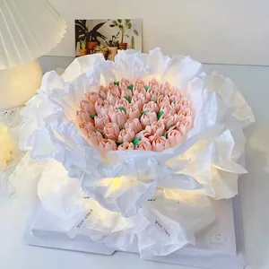 Detailed close-up of white pear paper layers used for a bouquet-style cake decoration