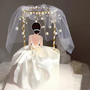 Elegant bride cake topper with pearl veil and silk dress for wedding or birthday
