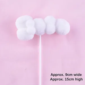Size detail of a fluffy white cloud cake topper made from soft pom-poms, 9x15cm