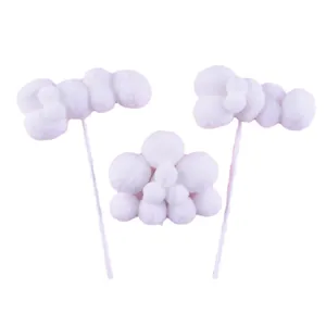 Handmade white fluffy pom-pom cloud cake toppers for birthday party decorations