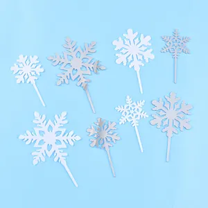 Variété de décorations de gâteaux flocon de neige argent et blanc pour fête d'hiver