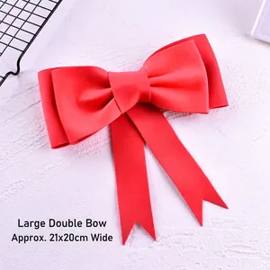 Close-up of a large red double-layer EVA bow for cake decoration, size 21x20cm.