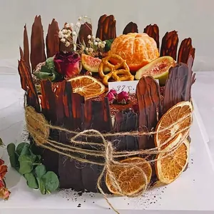 Close-up of natural jute twine wrapped around a chocolate decorated cake