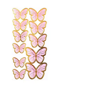 Gold foil butterfly cake toppers in pink for elegant birthday dessert decoration