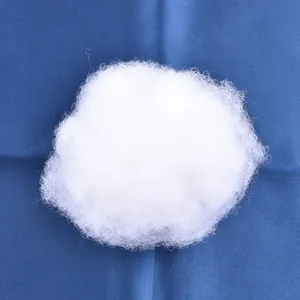 Close-up macro view of fluffy white synthetic fiber cloud for DIY birthday cake topper decoration
