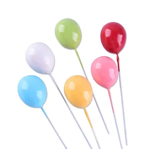 Set of colorful 3D mini balloon cake toppers for birthday party and creative baking decoration.