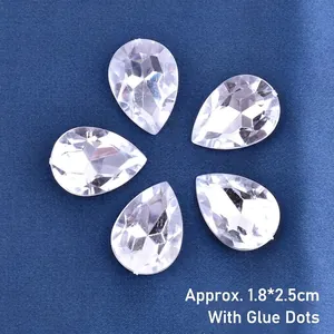 Detail view of teardrop clear crystals for cake decoration with size 1.8x2.5cm