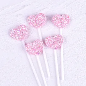 Five-piece set of pink glittery heart cake toppers for birthday and party dessert decoration