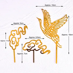 Detailed size specifications for the 3-piece golden acrylic crane and cloud cake toppers.