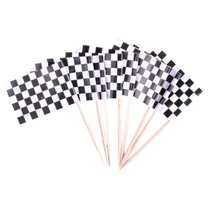 Set of 24 checkered racing flags cake toppers with wooden toothpicks on white background.