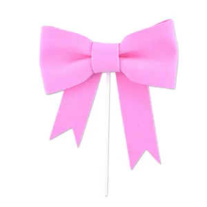 Elegant pink bow tie cake topper for birthday decorations and party baking supplies
