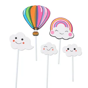 Set of cute smiley cloud and colorful hot air balloon cake toppers for birthday party