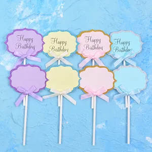 Set of pastel birthday cake toppers with glitter edges and bows for DIY birthday party decor