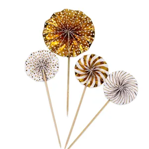 Set of 4 elegant gold and white paper fan cake toppers featuring assorted patterns