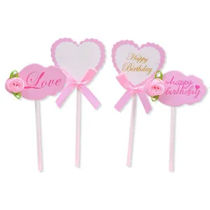 Set of 4 pink heart and cloud cake toppers with bows and roses for birthday decor