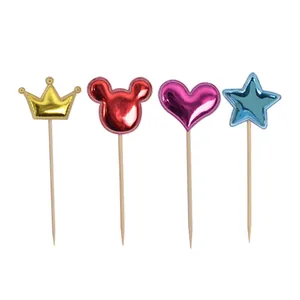 Set of 4 metallic PU cake toppers with crown, heart, and star shapes
