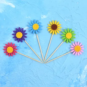 Six colorful felt sunflower cake toppers for birthday party dessert table decoration